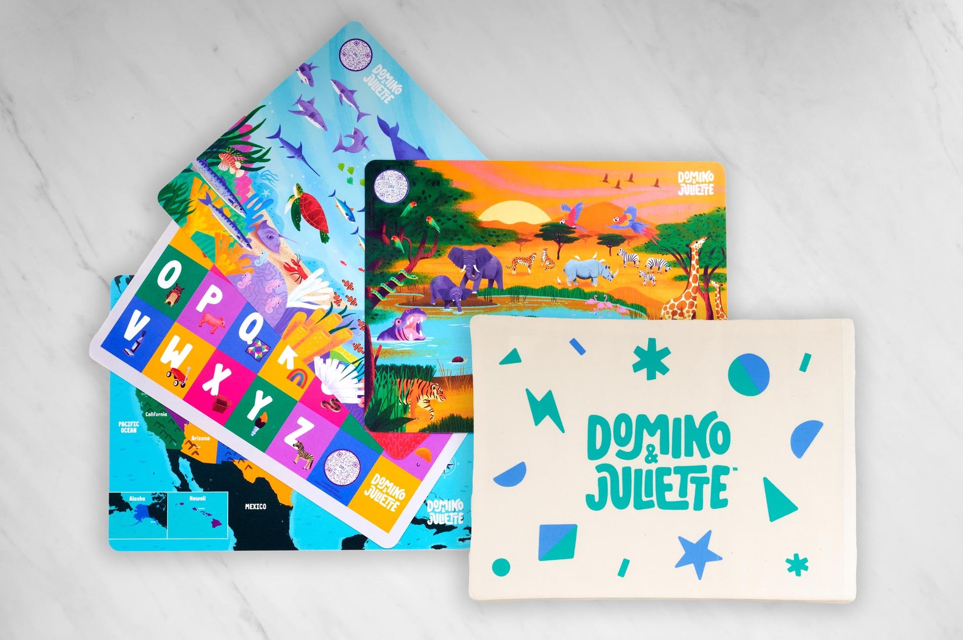 Domino Juliettte Travel Placemats: 4-Pack of Portable Kids' Activity Mats with Alphabet, Map, Safari, and Sea Themes