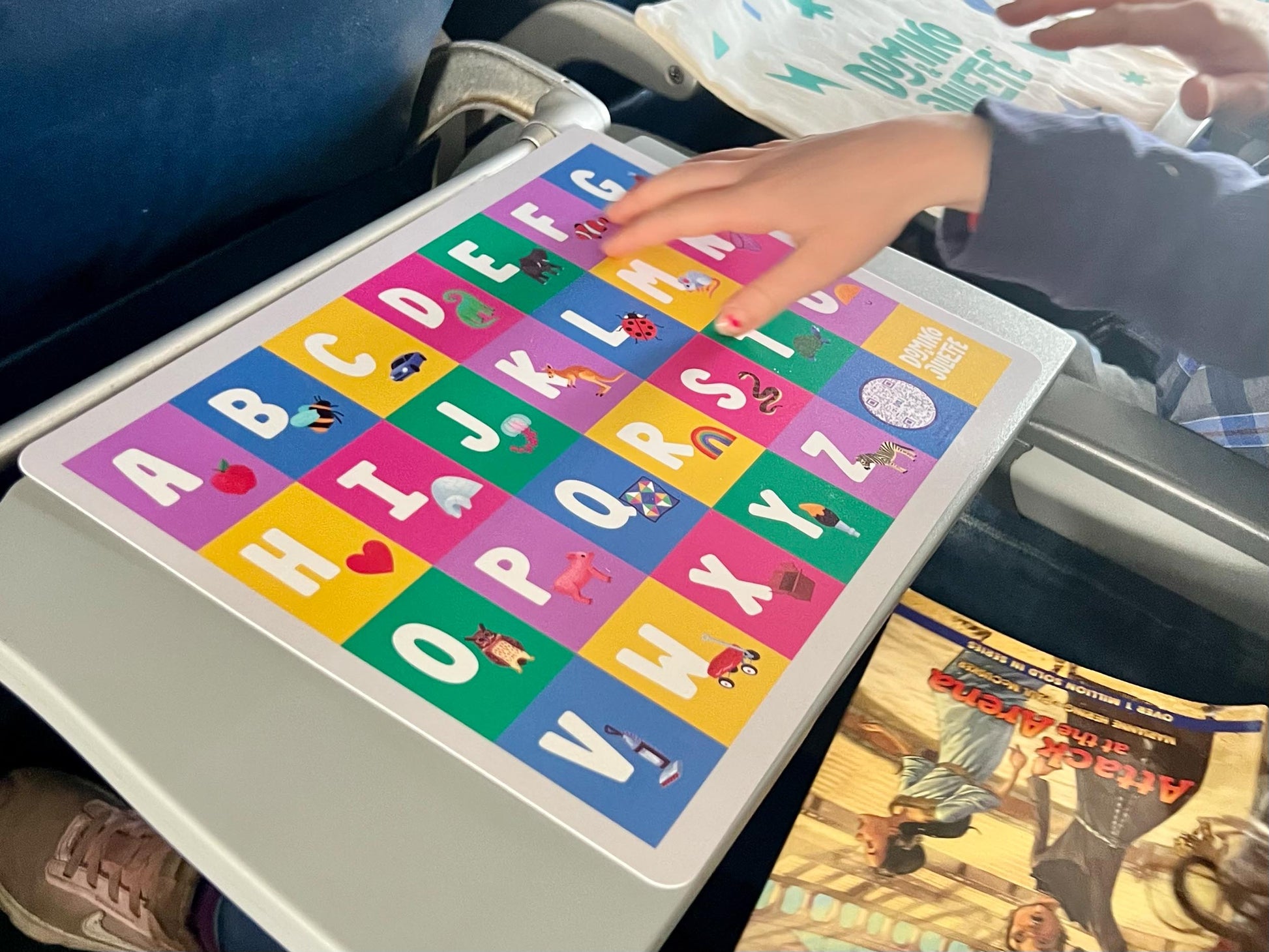 Domino Juliette Alphabet Travel Placemat on Airplane Tray - Kids Travel Activity, Educational Placemat, Airplane Entertainment