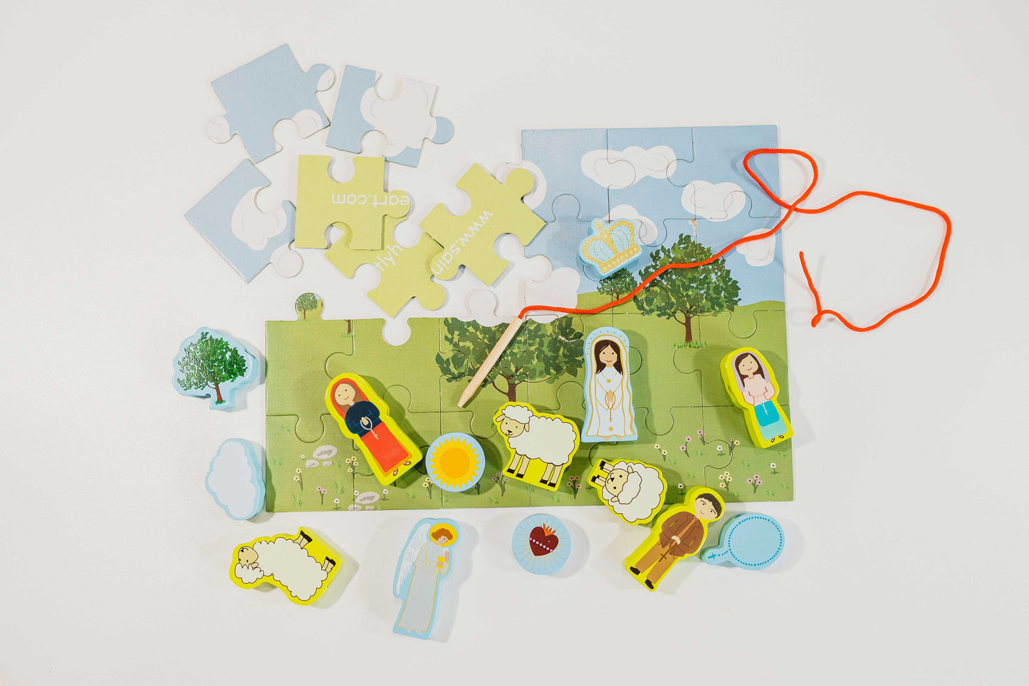 Fatima Lacing Set Catholic Toy Puzzle Planet: Wooden figures, puzzle, and saints for creative play.