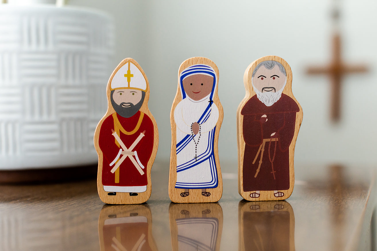 World Charity Set: Wooden figures of Saint Blaise, Mother Teresa, Padre Pio. Puzzle Planet.
